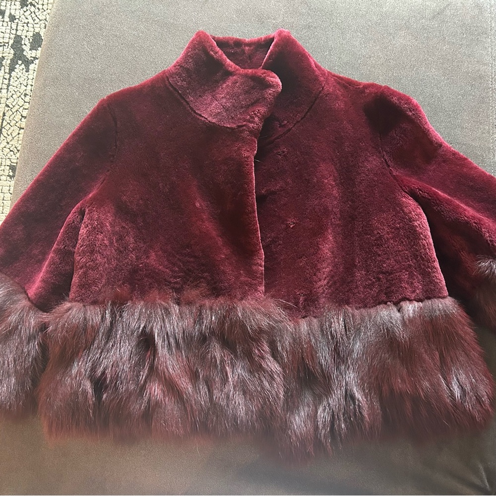 Gorgeous, beautifully made sheep skin and fox fur jacket.